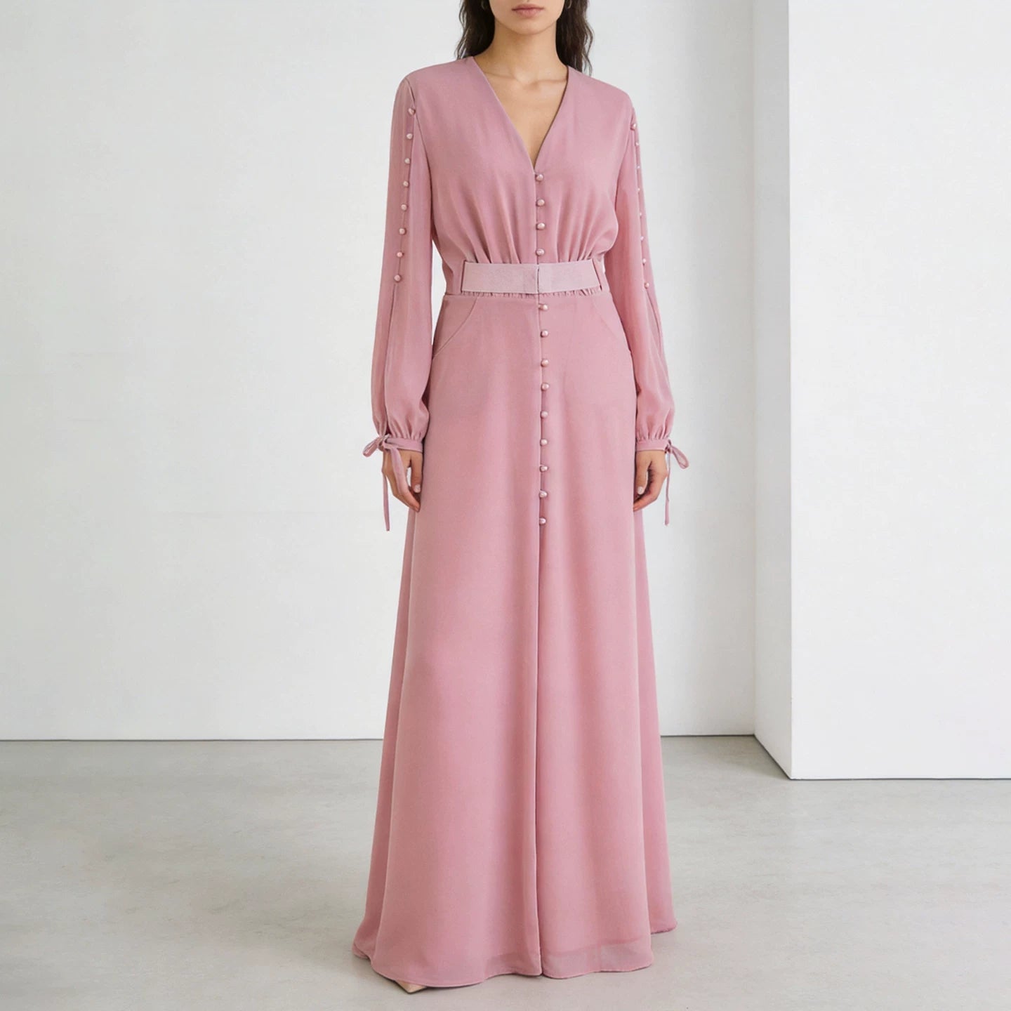 فستان بوليستر وردي مع رباط خصر وإغلاق بأزرار